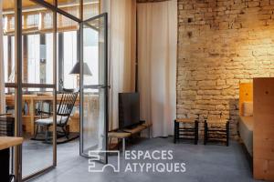 Bilde i galleriet til Loft réhabilité dans une ancienne menuiserie à 1km de la plage i Le Bois-Plage-en-Ré