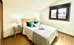 A bed or beds in a room at O LAR DE MARTINA