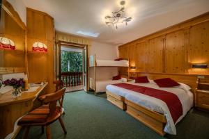 Postel nebo postele na pokoji v ubytování Hotel il Cardo