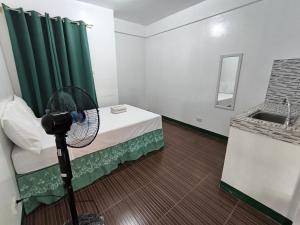 Voodi või voodid majutusasutuse V Star CALAPAN - HOURLY! DAILY! WEEKLY! MONTHLY! BAGO! MALINIS! MAY PARKING! toas