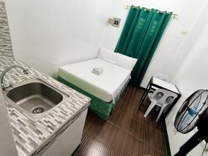 Voodi või voodid majutusasutuse V Star CALAPAN - HOURLY! DAILY! WEEKLY! MONTHLY! BAGO! MALINIS! MAY PARKING! toas