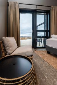 Katil atau katil-katil dalam bilik di Stuðlastrengur - Luxury private villa