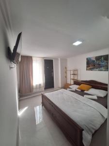 Postel nebo postele na pokoji v ubytování Ortachala Summer House