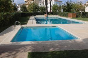 Bazén v ubytování Cunit Vacation nebo v jeho okolí
