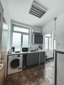 Η κουζίνα ή μικρή κουζίνα στο Twin-Tam House +2 φωτογραφίες