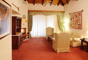 Posezení v ubytování HOTEL SPA MONTANA