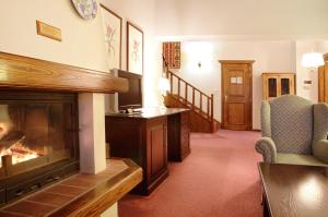 Posezení v ubytování HOTEL SPA MONTANA