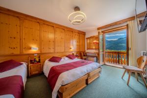 Postel nebo postele na pokoji v ubytování Hotel il Cardo