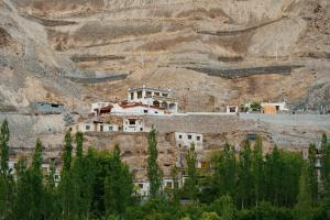 a building on the side of a mountain at Domkhar Eco Homestay in Dumkhar
