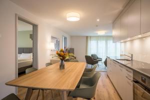 Kuchyň nebo kuchyňský kout v ubytování Modern City Apartments + 8 fotografií