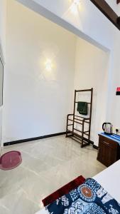 TV a/nebo společenská místnost v ubytování Jilan Homestay