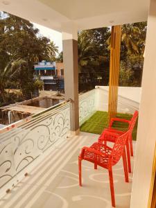 Balkón nebo terasa v ubytování Palm Paradise Home Stay