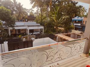 Balkón nebo terasa v ubytování Palm Paradise Home Stay