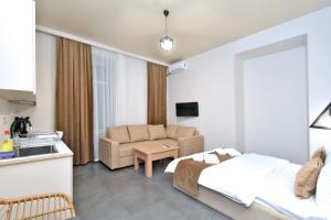 TV a/nebo společenská místnost v ubytování Seva Apart-Hotel Komitas + 36 fotografií