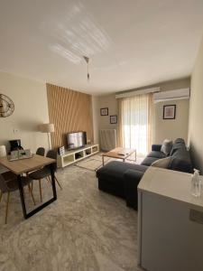 TV a/nebo společenská místnost v ubytování G&M Home + 12 fotografií