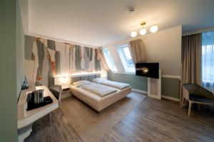 Postel nebo postele na pokoji v ubytování Hotel Gasthaus zur Linde