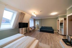 Postel nebo postele na pokoji v ubytování Hotel Gasthaus zur Linde