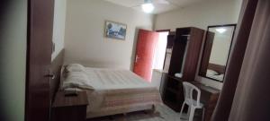 Giường trong phòng chung tại Hotel JB