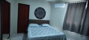 Giường trong phòng chung tại Hotel JB