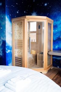 Postel nebo postele na pokoji v ubytování Hotel Royal