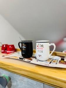 Příslušenství pro přípravu čaje a kávy v ubytování Apartments Paradise
