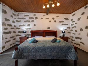 Postel nebo postele na pokoji v ubytování Casinha dos cinco sentidos
