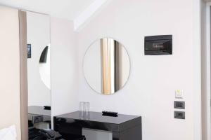 TV a/nebo společenská místnost v ubytování Senator Hotel