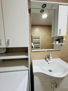 Koupelna v ubytování Apartments Paradise + 37 fotografií