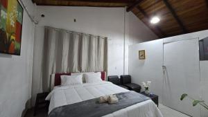 Habitación sin cocina en quinta Shizen客房内的一张或多张床位