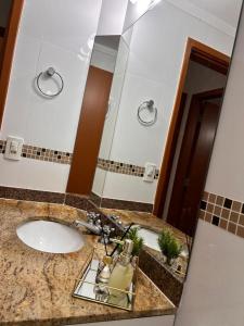 Un baño de Flat Pitangueira com Piscina-Capitânia Varan