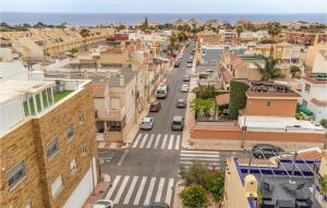 an aerial view of a city street with buildings at 3 Bedroom Gorgeous Home In Aguadulce in El Campillo del Moro +13 photos