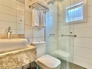 Koupelna v ubytování Hotel Glamour da Serra + 37 fotografií