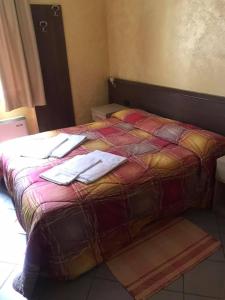 Postel nebo postele na pokoji v ubytování Hotel ristorante 2 Platani