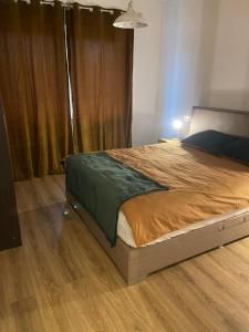 Кровать или кровати в номере ApartChazal