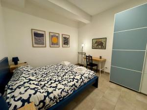 Ένα ή περισσότερα κρεβάτια σε δωμάτιο στο Trastevere Cozy Retreat
