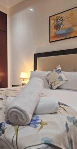 Postel nebo postele na pokoji v ubytování Appart Hotel Rania