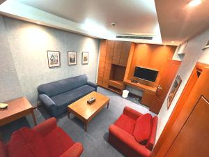 TV a/nebo společenská místnost v ubytování Caesar's Park Hotel + 37 fotografií