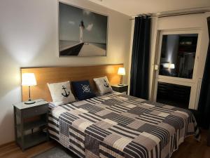 Posteľ alebo postele v izbe v ubytovaní Apartament Marcin