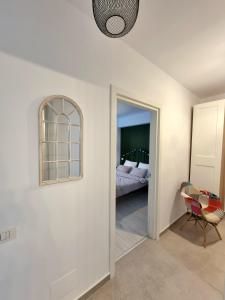 Postel nebo postele na pokoji v ubytování Marianne, Apartament 2 Camere, Morii Lake 2