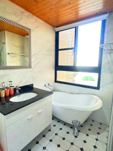 Vannituba majutusasutuses Apple Homestay
