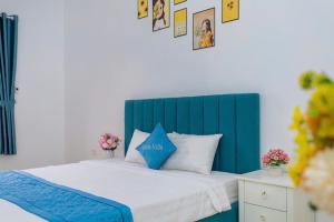 Ένα ή περισσότερα κρεβάτια σε δωμάτιο στο G-Villa 32 - Free Bida - Loa Karaoke - Gần Cột Cờ Bãi Sau Thùy Vân