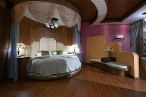Gucheng Lanshe Designer Garden B&B客房内的一张或多张床位