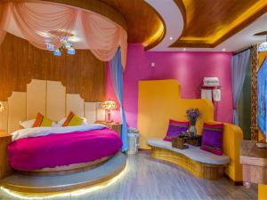 Gucheng Lanshe Designer Garden B&B客房内的一张或多张床位