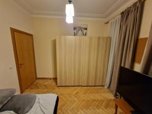Postel nebo postele na pokoji v ubytování Kaunas Center Apartment
