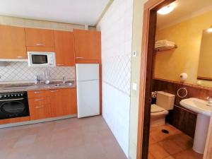 A kitchen or kitchenette at La Quintana de Villar