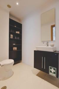 Ένα μπάνιο στο Relax Caparica Home