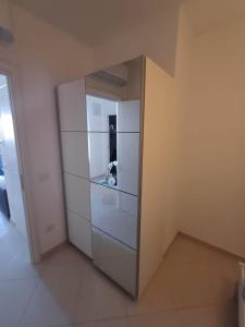 A kitchen or kitchenette at Villa NOVE - Residence dei Fiori
