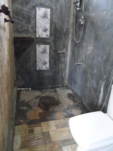 Ванная комната в Sigiri Lake Paradise