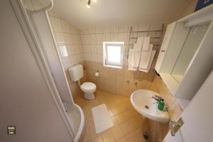 Kúpeľňa v ubytovaní Apartment Josip