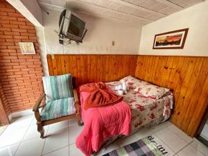 Cama ou camas em um quarto em Pousada Colibri Serrano